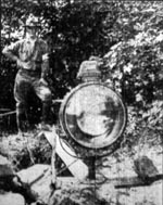 One of the high powered search lights established on the recent firing line by the military authorities.
The rays from the light are thrown hundreds of feet, lighting up the hillsides and mountain tops
sufficiently to discern the smallest movable objects. Charleston Gazette, 8 September 1921