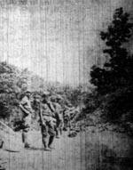 Soldiers pitching camp tents atop Blair Mountain. Photo taken by R. Sylvan Wallace of Wallace
Studio, 218 1/2 Capitol Street, Charleston. Charleston Gazette, 8 September 1921