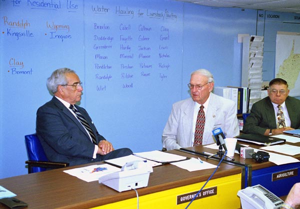 Governor Cecil Underwood and Commissioner of Agriculture Gus Douglass
at drought meeting