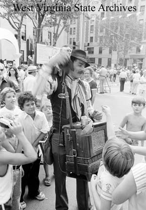 Organ grinder Guisseppe Boscio and his Capuchin monkey Giorgio
performing at the first Italian Heritage Festival in Clarksburg