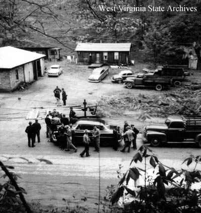 Striking miners in Widen being arrested after the murder of Charles
Frame