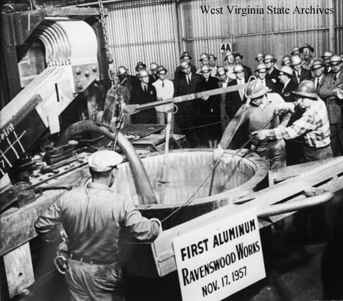 Workers at Kaiser Aluminum producing first
aluminum