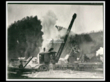 Railroad hoist at mine Number 261, with men working. This picture is also found in the DeHaven Collection, Roll 1601 13.