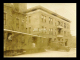 Freight House in Fairmont with truck and Fairmont and Clarksburg Traction Company express car.