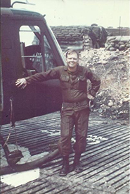 Jamie Barton beside his helicopter. Courtesy Vietnam Veterans Memorial Fund