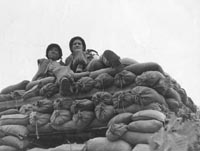 Criss and friend taken atop
of new fighting bunker between May 25 and 30, 1953.