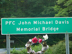 Sign designating the bridge named for Pfc. John Michael Davis. Find A Grave photo courtesy Treva Brown 
Simpson
