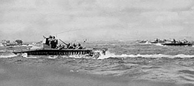 Amphibian tractor and tank battalions coming ashore in the Battle for Saipan. Photo from U.S. Army Center of Military History